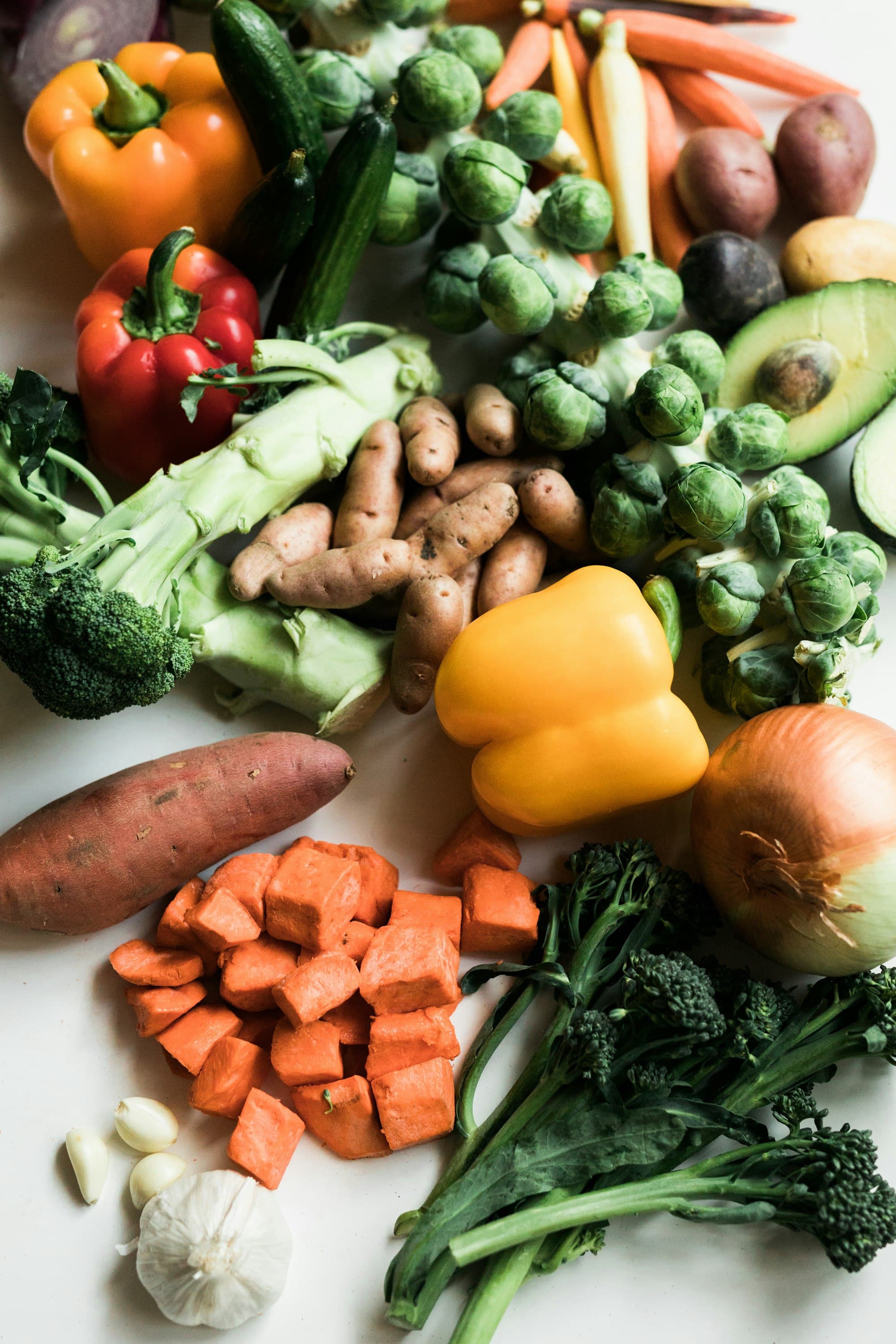 Fresh vegetables and herbs on a dark background